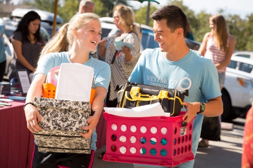 Orientation team members move students into Page Hall