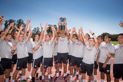 The Warriors pose with the Bryant & Sons Cup at Thorrington Field on Aug. 21. 