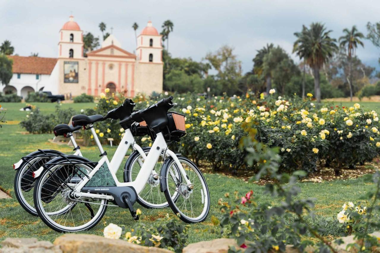 Two E-Bikes on the Rose Garden Lawn in front of the Old Santa Barbara Mission