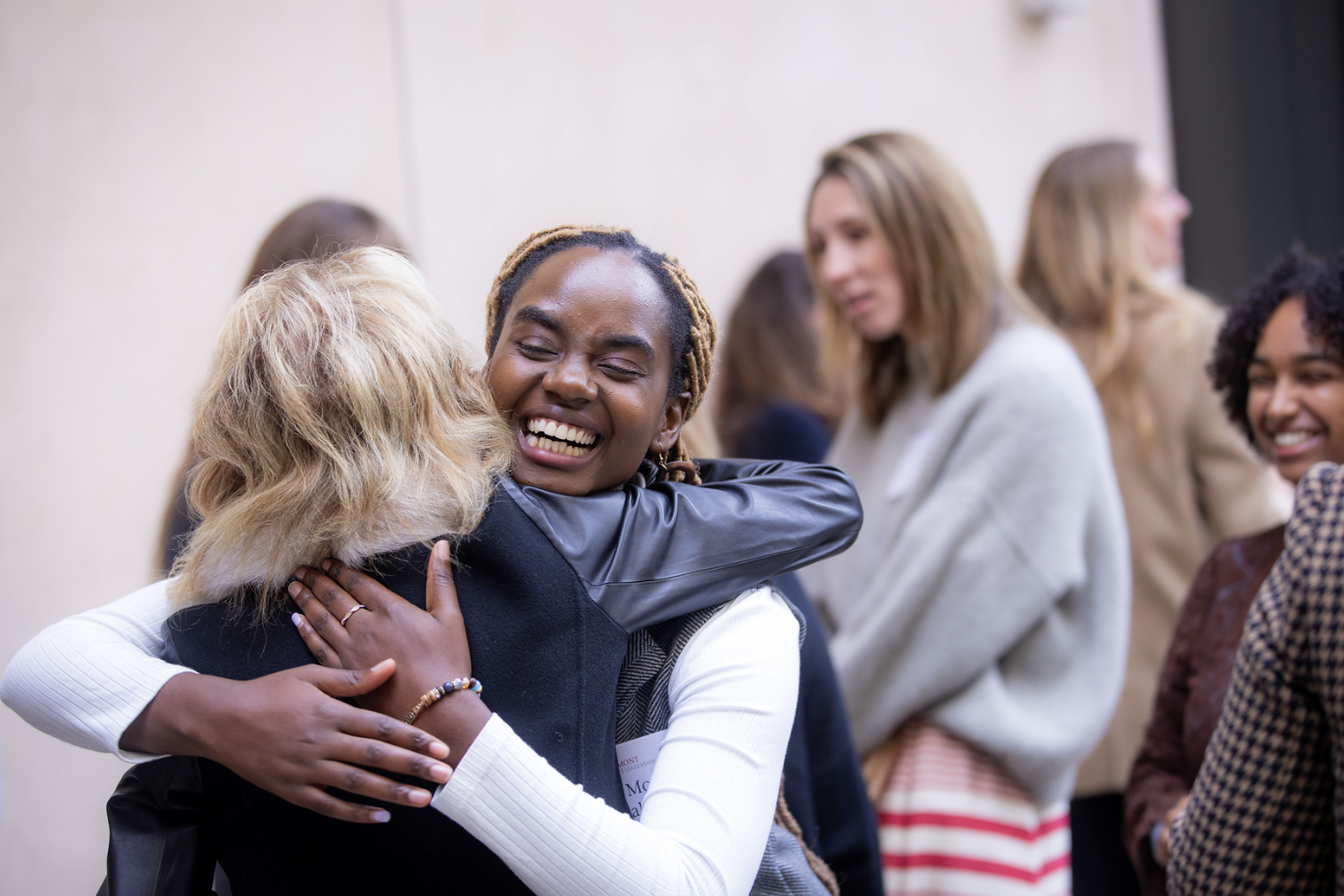 students hugging